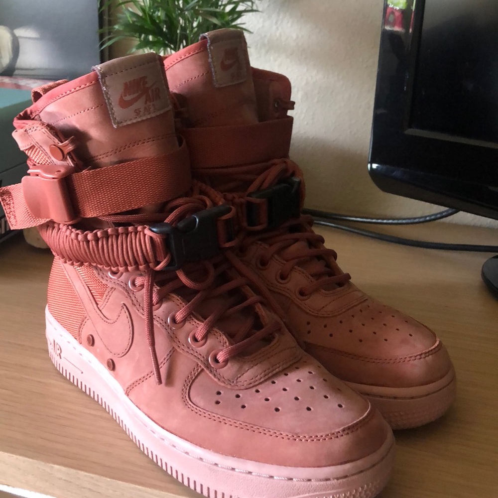 Nike Women's Sneakers in Rust Red